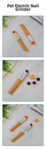 Electric pet nail grinder set with orange accents and three spare replacement wheels