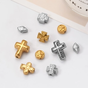 Assorted gold and silver stainless steel cross and floral spacer beads for DIY jewelry