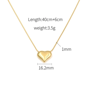 Detailed view of 18k gold heart pendant necklace with full product dimensions and specs