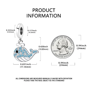 Detailed size measurement of 925 silver whale charm with blue crystals and 25-cent coin
