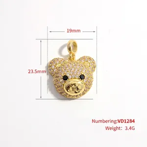 Sparkling crystal bear head pendant with white zircon stones and black gemstone eyes