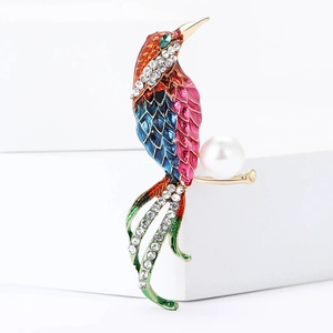 Detail of bird brooch with multi-color enamel, rhinestones and white faux pearl accent