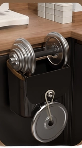 Hanging kitchen trash bin in matte black showing strong 20kg weight capacity test