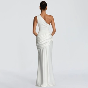 Detail of white satin dress showing elegant waist pleats and shiny silk texture finish
