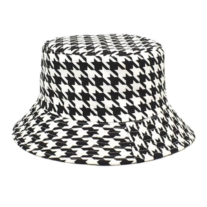 Double-sided houndstooth and solid color bucket hat for women with a wide brim