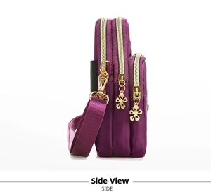 Side view of purple multi-layer nylon crossbody phone bag with gold flower zippers
