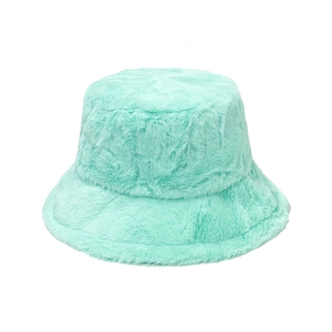 Close-up of mint green faux fur bucket hat showing soft plush texture and thick warm material