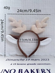 Vue détaillée du serre-tête bois de renne en peluche avec oreilles blanches douces
