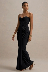 Detailed view of elegant black strapless dress with ruching and side drape fabric