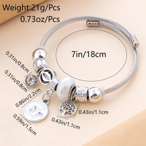 Detailed view of silver-plated charm bracelet with 18cm diameter and sparkling zircons