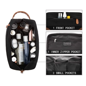 Detail view of large capacity waterproof canvas toiletry bag with multiple storage pockets
