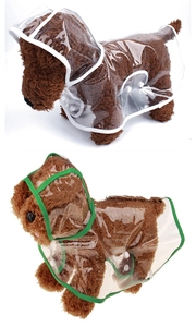 Close-up of transparent PVC dog raincoat with contrasting green and white trim details