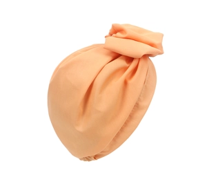 Close-up of peach twisted knot headscarf with detailed pleated fabric texture