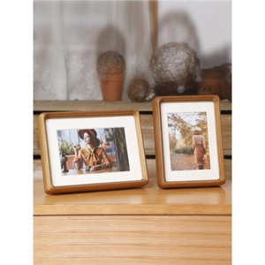 Classic black walnut solid wood picture frames in horizontal and vertical orientations