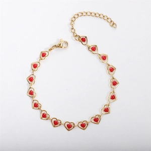 Detail view of 18k gold-plated heart bracelet with vibrant red drip oil enamel charms