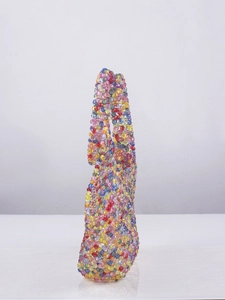 Close-up of handmade acrylic beaded bag detailing colorful hollow weave and clear crystal beads