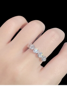 Detailed view of S925 sterling silver ring featuring heart-cut sparkling cubic zirconia