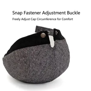 Men's newsboy cap with adjustable metal buckle back showing textured grey fabric