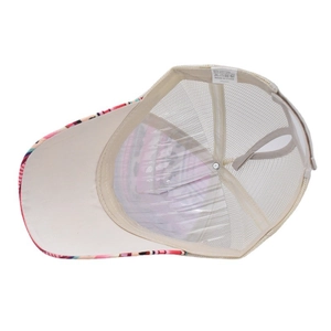 Detail view of ponytail baseball cap with breathable mesh and vibrant abstract print