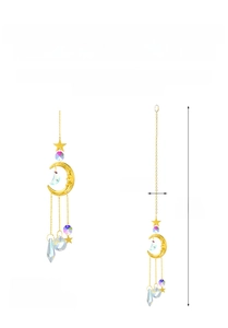 Detail of suncatcher with golden crescent moon star and crystal prism for rainbow light