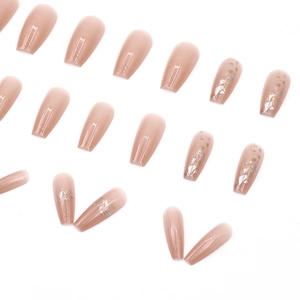 Translucent nude pink coffin press-on nails with silver foil accents and glitter