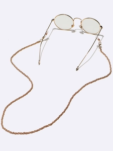 Detail of 70cm gold metal rope chain eyewear strap with silicone anti-slip loops