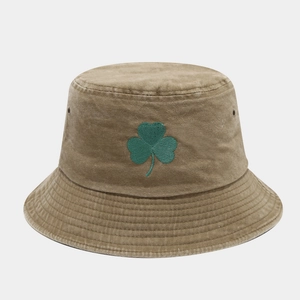 Khaki washed cotton bucket hat with green shamrock embroidery and metal eyelets