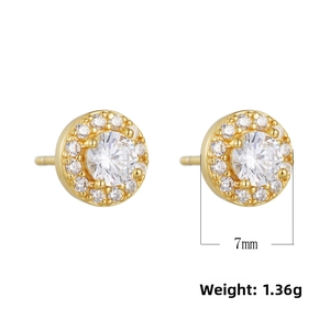 Macro view of 7mm gold halo stud earrings with cubic zirconia and 1.36g weight