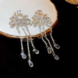 Elegant crystal flower tassel earrings with shimmering droplet pendants on silver needles