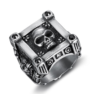 Detailed shot of a gothic skull ring with black zircon stones and vintage silver finish
