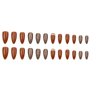 Faux ongles amande dorés et marrons avec paillettes et strass de perles élégants