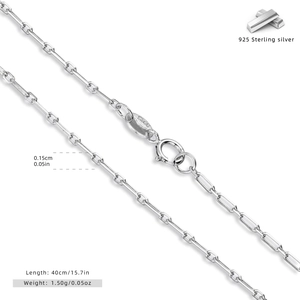 Detailed macro view of S925 sterling silver paperclip chain with hallmark on clasp