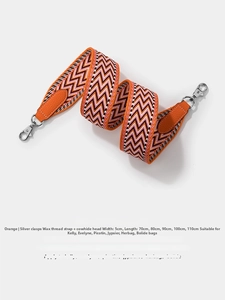 Detail of 5cm orange chevron woven strap with leather ends and silver swivel clasps