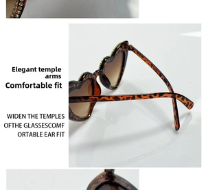 Detailed view of leopard print heart sunglasses with crystal rhinestones and wide temples