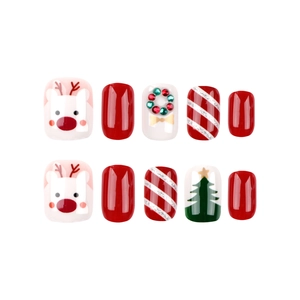 Short Christmas press-on nails with reindeer, candy cane stripes, and festive motifs