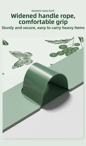 Macro detail of widened ergonomic green handle for comfortable weight distribution