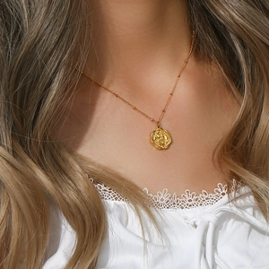 Golden stainless steel bead chain necklace featuring a vintage cherry blossom rose pendant