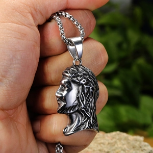 Hip hop titanium steel necklace featuring a detailed silver Jesus head pendant for men