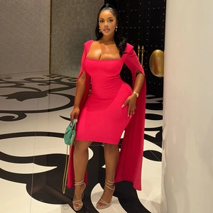 Detail of elegant rose red bodycon dress featuring dramatic long split cape sleeves