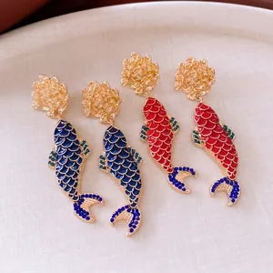 Exquisite koi fish tassel earrings with enamel scales and sparkling crystal accents