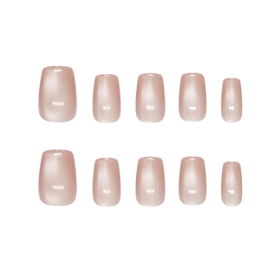 Pink cat eye press-on nails with shimmering squoval shape and minimalist sweet style