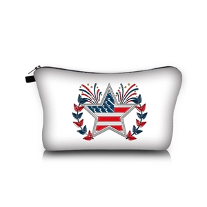 Close-up of portable cosmetic bag with American flag star print and black zipper detail