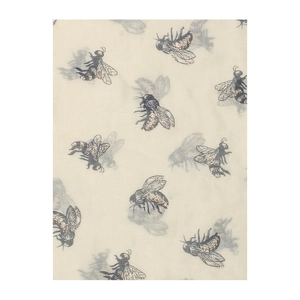 Detailed macro view of honey bee print scarf with shimmering metallic glitter finish
