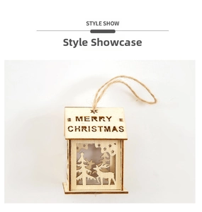 Detail of laser-cut wooden house ornament with Merry Christmas text and reindeer cutout