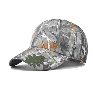 Close-up of leaf camouflage baseball cap with realistic oak leaf patterns and sturdy stitching