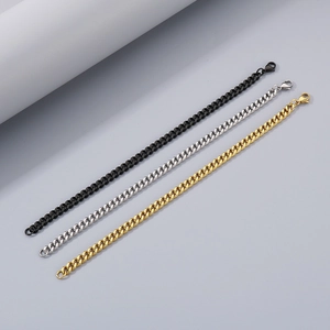 Classic stainless steel Cuban chain bracelet set in black, gold, and silver finishes
