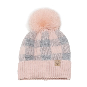 Close-up of pink checkered knit beanie with faux fur pom and maple leaf leather patch