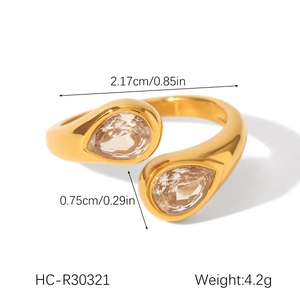 Detail of 18K gold-plated stainless steel open ring with pear-cut zircon stones