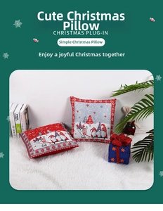 Detailed view of red and grey Christmas pillowcases with reindeer and Santa Claus patterns