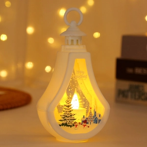 Detail of Christmas lantern featuring miniature snowman, pine tree and golden text